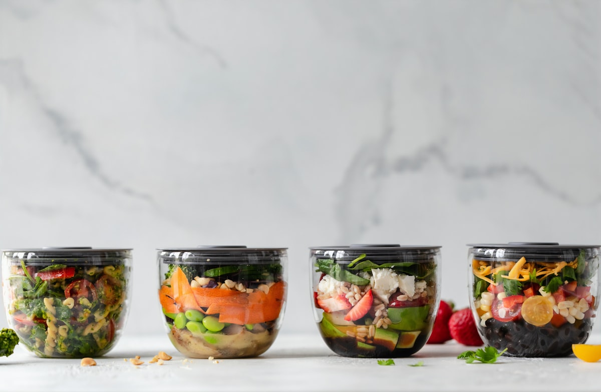 Smoothie bowls topped with fresh fruit and granola